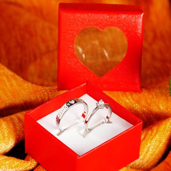 Silver colored love rings